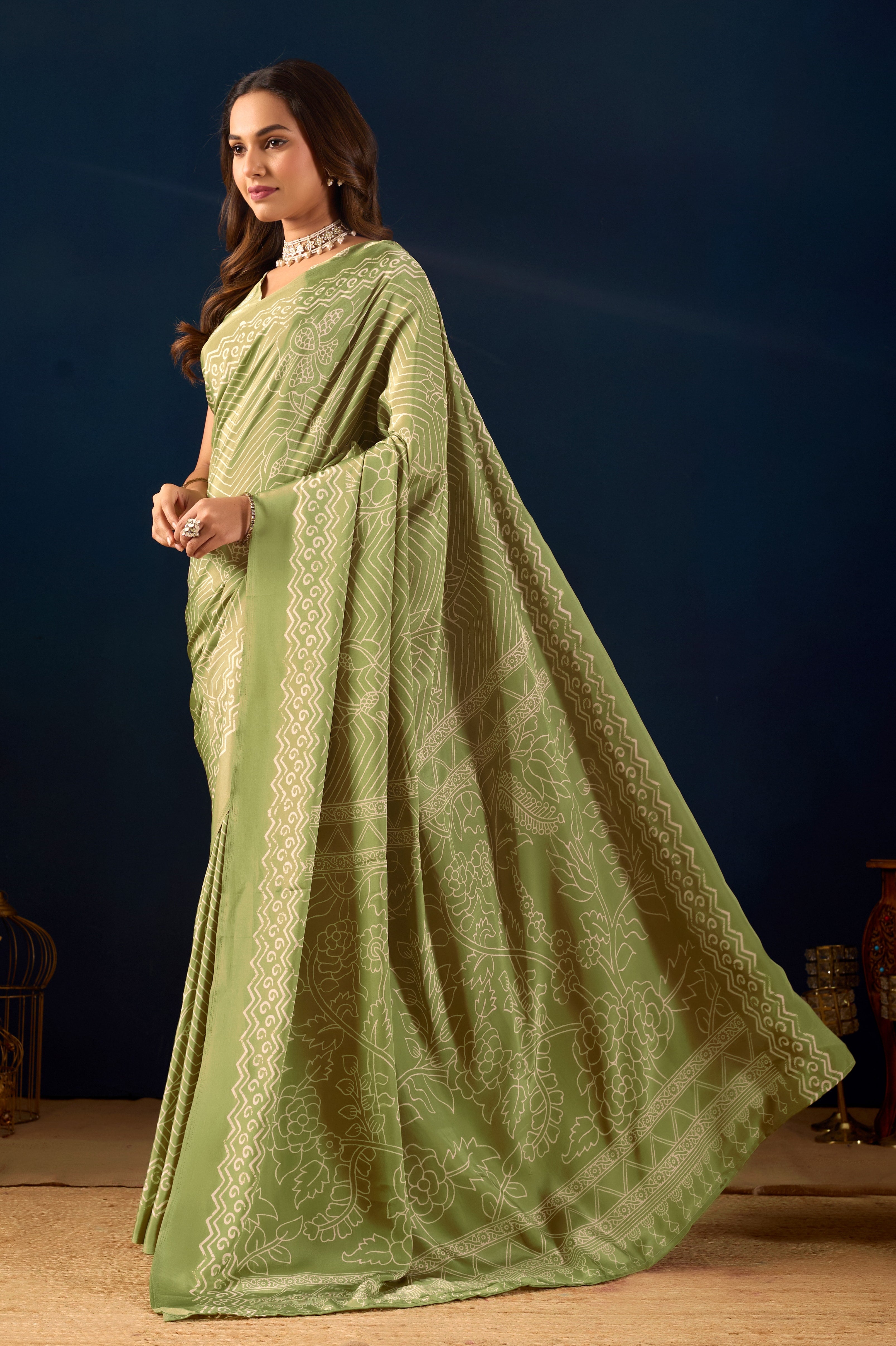Ethereal Pista Green Saree with Intricate Geometric Floral Patterns .