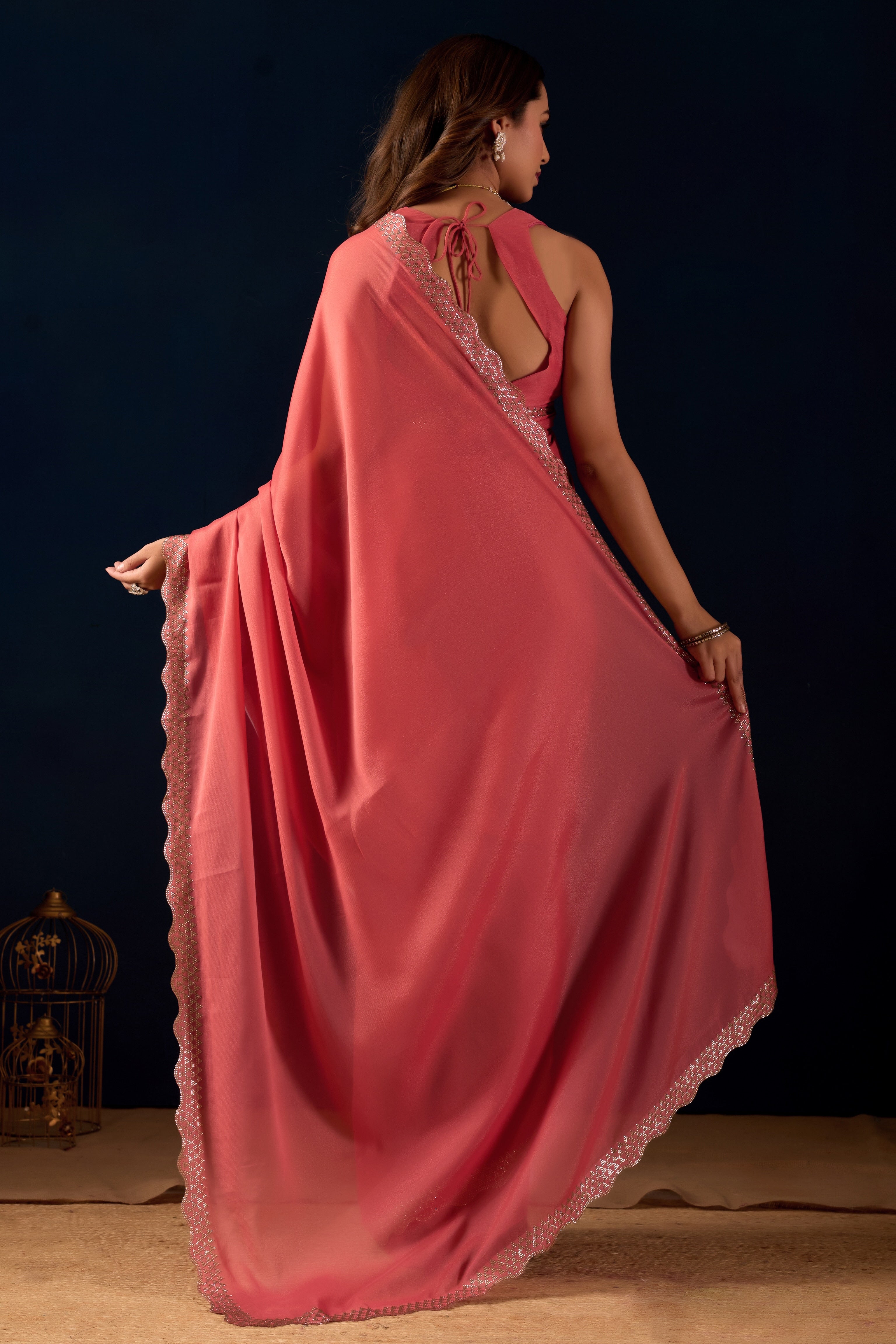 Shimmering Polly Georgette Saree with Designer Scalloped Borders .