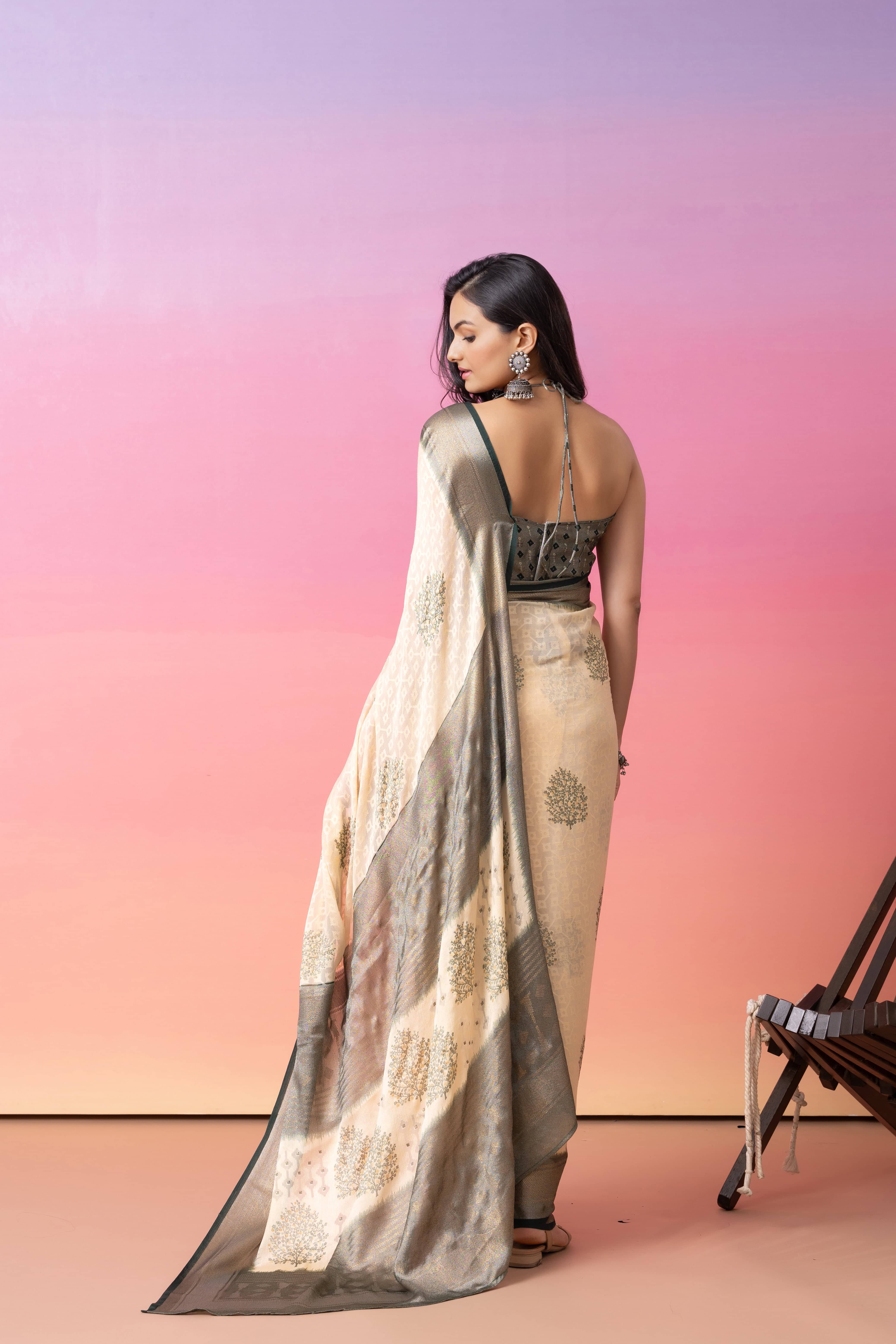 Batik Printed Moss Brasso Saree With Foil Print Border