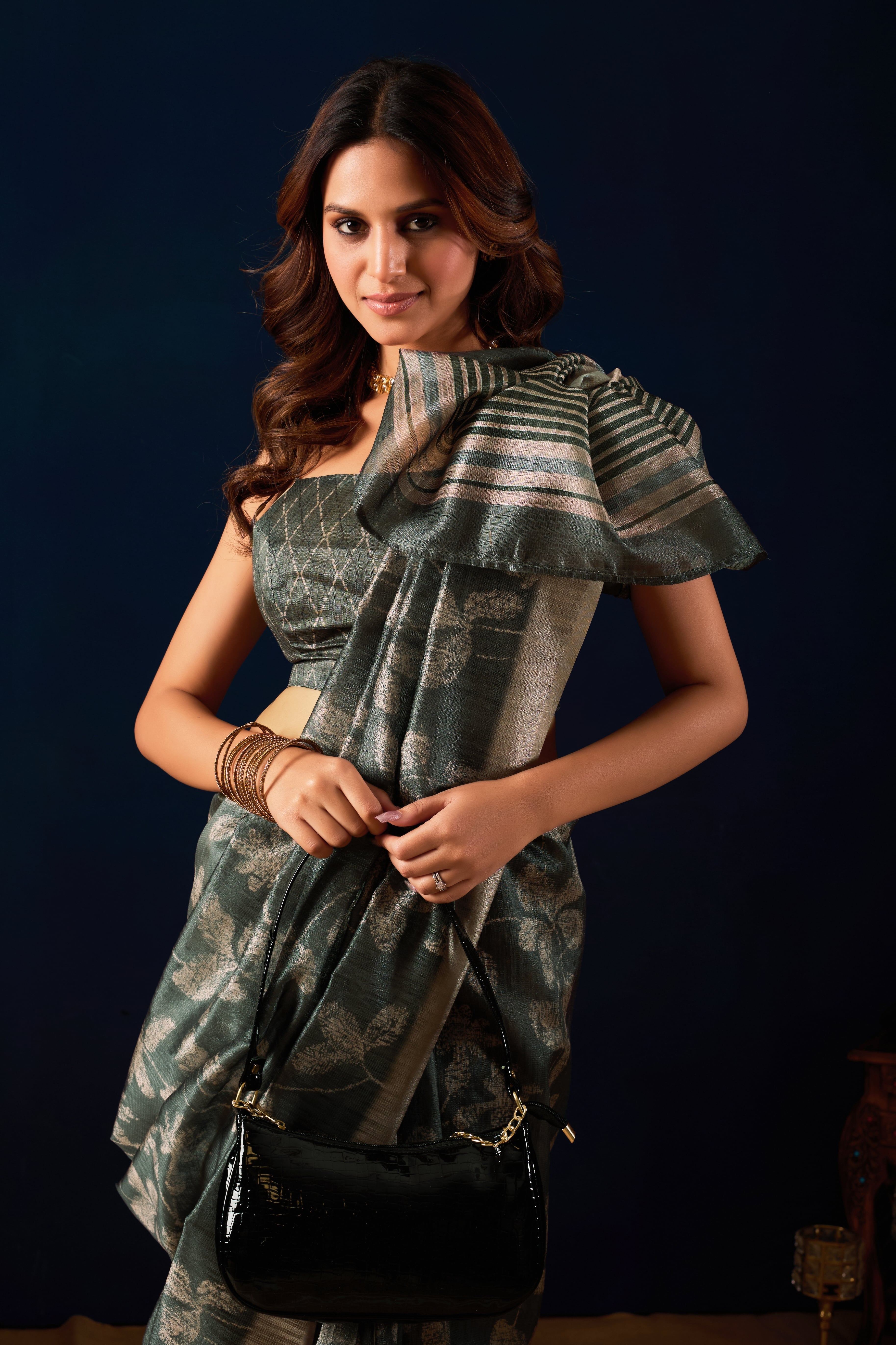 Likely a Silk-Cotton blend or Chanderi Silk with a subtle sheen.