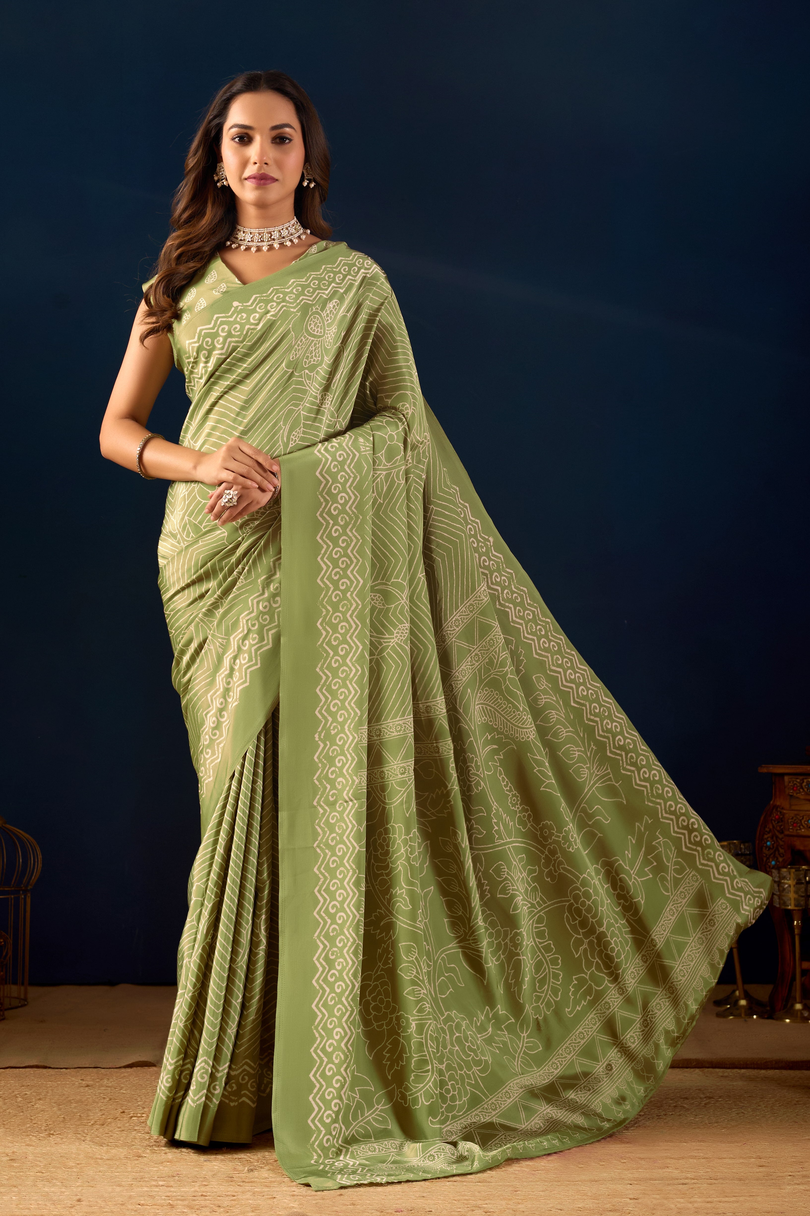 Ethereal Pista Green Saree with Intricate Geometric Floral Patterns .