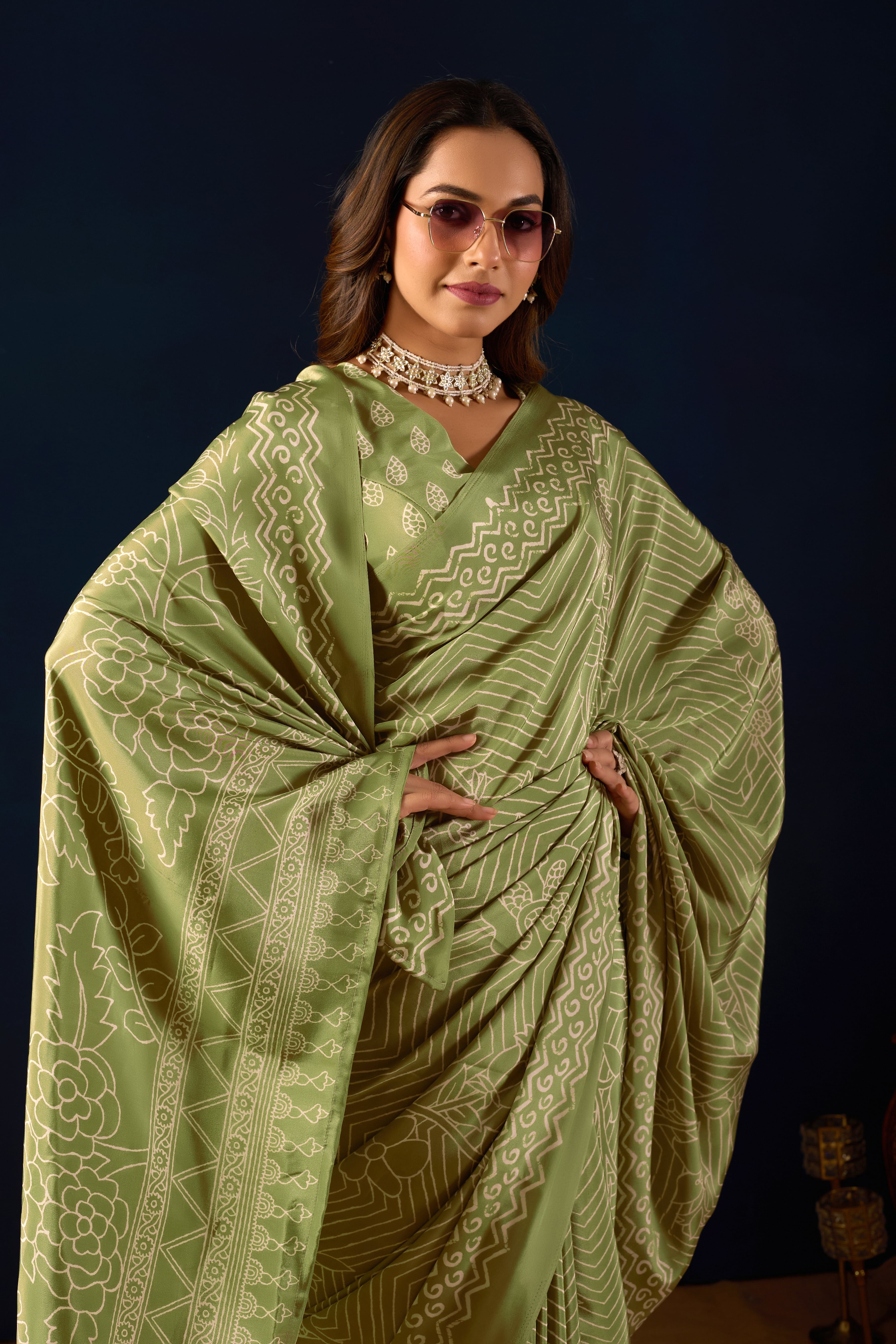 Ethereal Pista Green Saree with Intricate Geometric Floral Patterns .