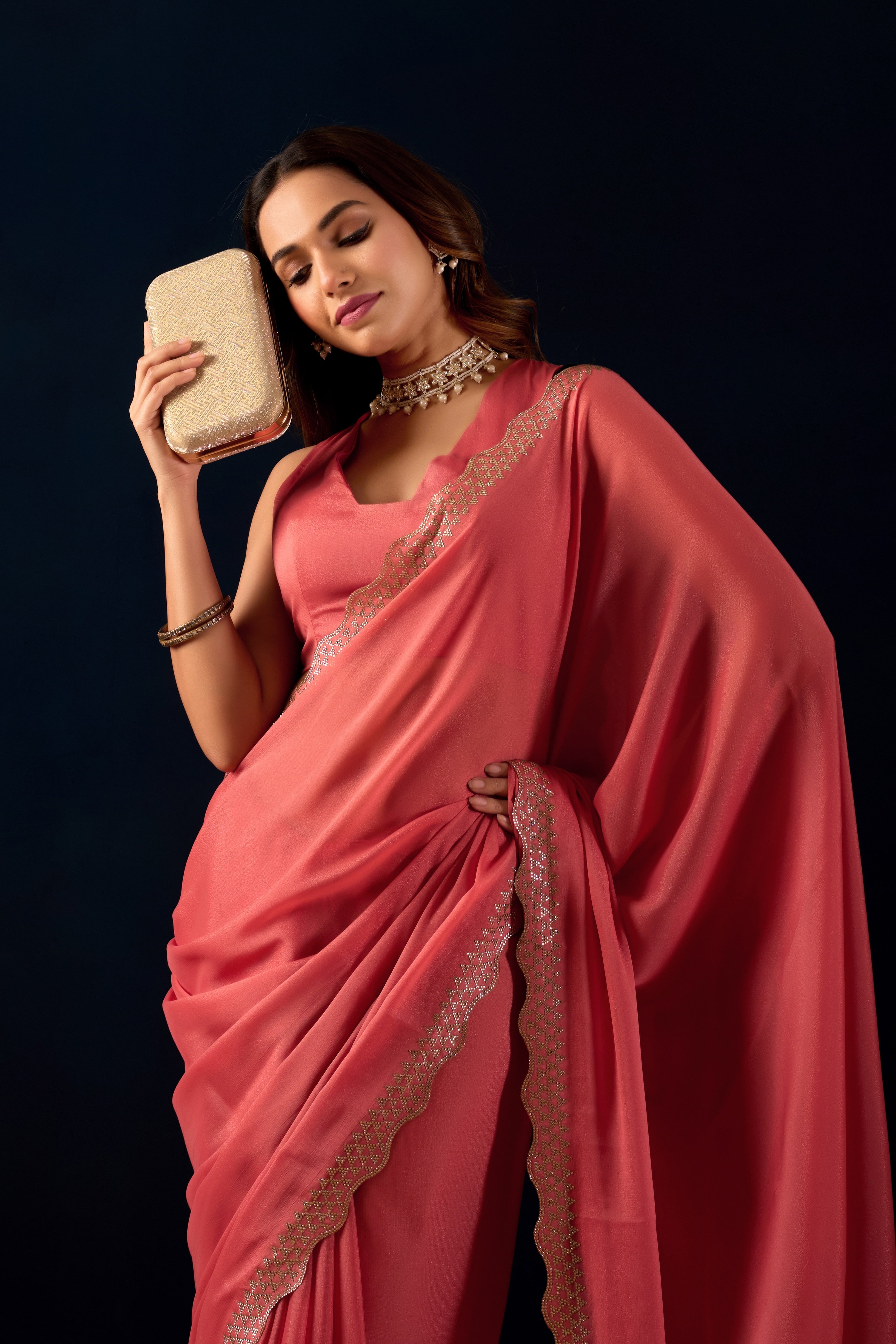 Shimmering Polly Georgette Saree with Designer Scalloped Borders .