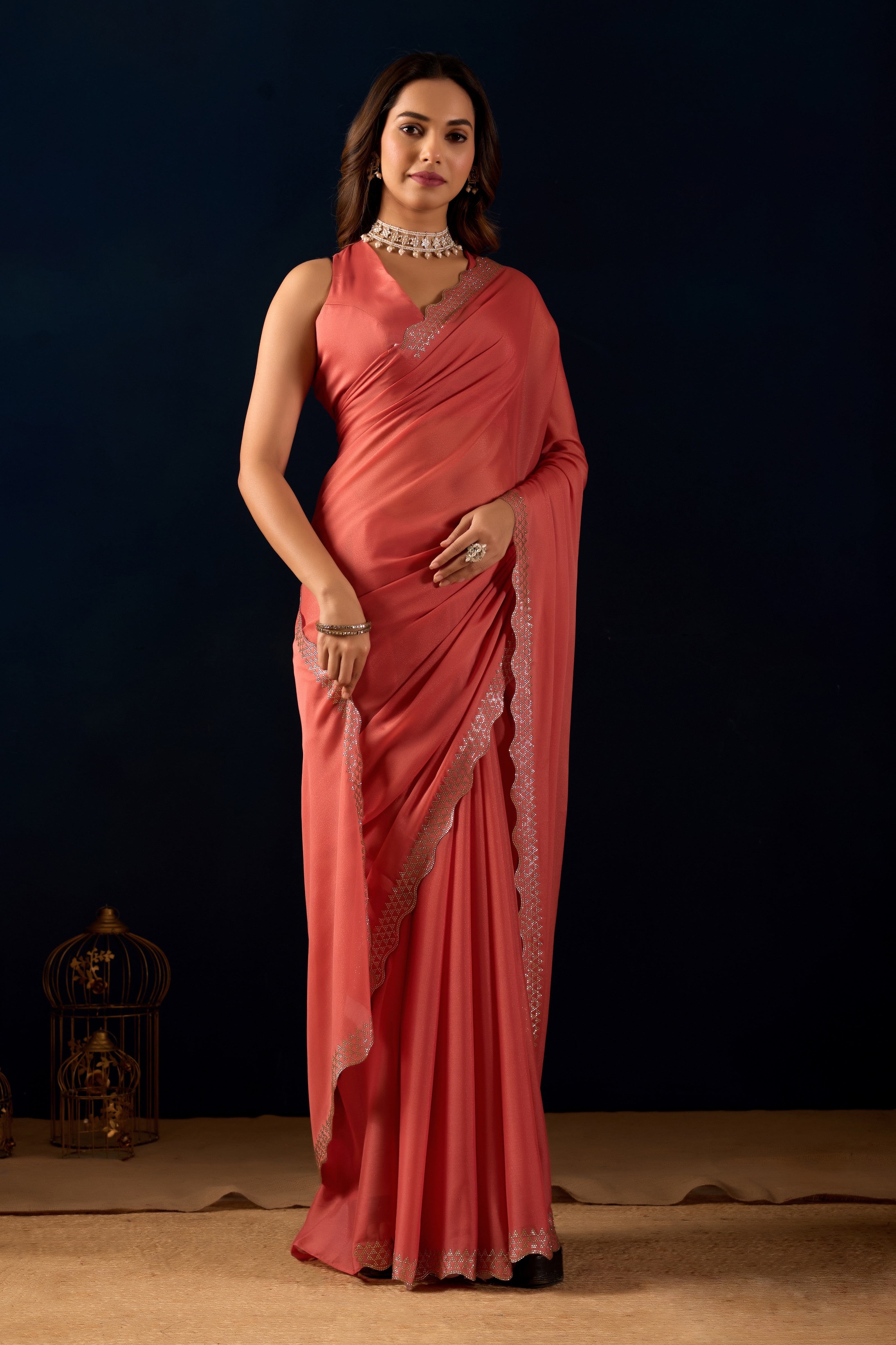 Shimmering Polly Georgette Saree with Designer Scalloped Borders .