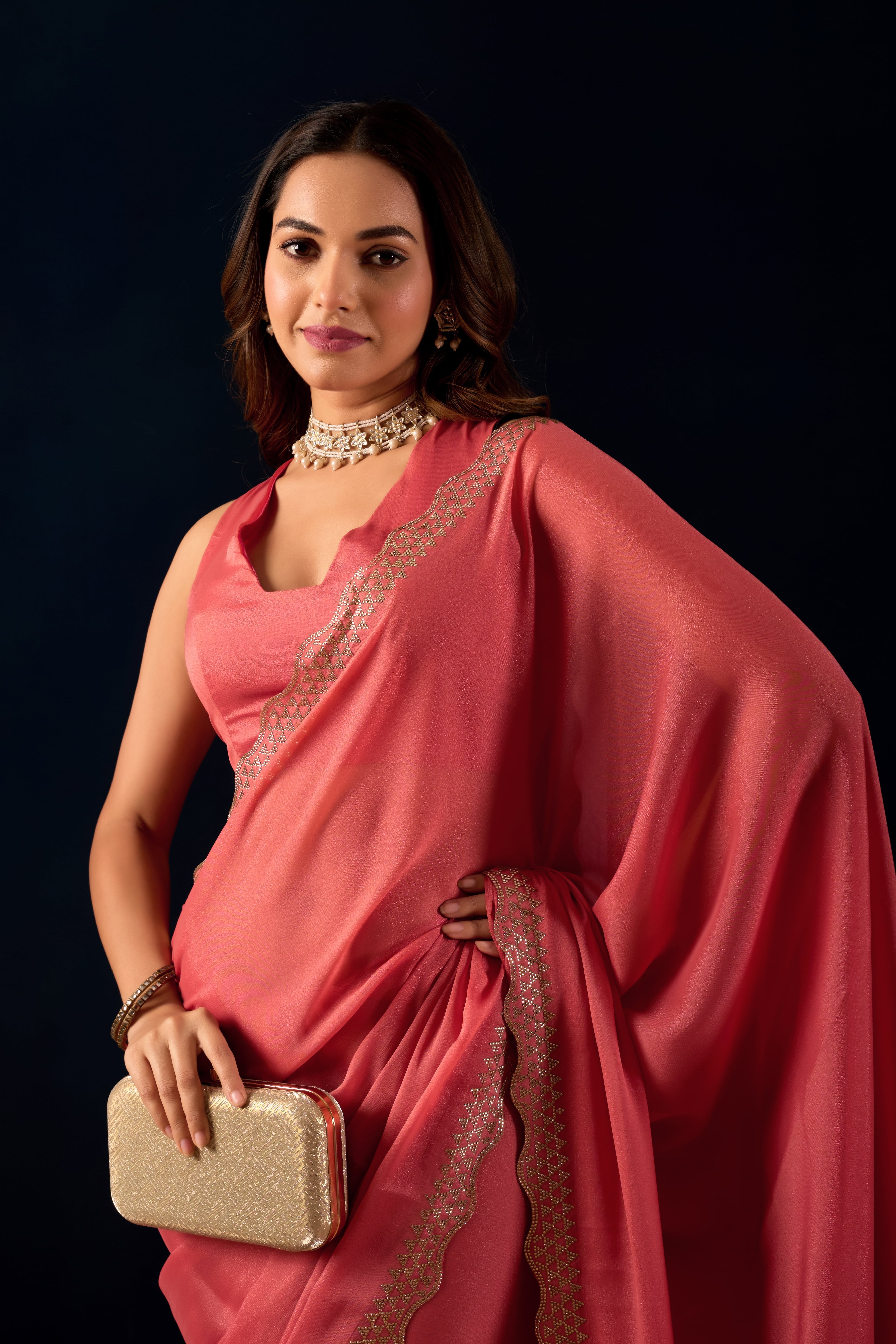 Shimmering Polly Georgette Saree with Designer Scalloped Borders .